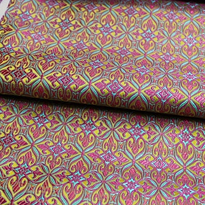 Colorful Nigerian jacquard brocade fabric with geometric weave