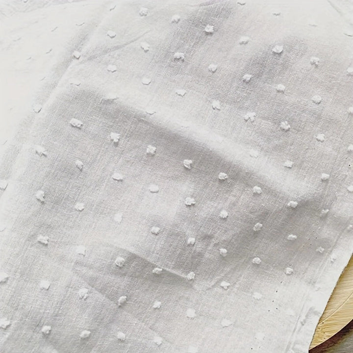Textured white jacquard cotton fabric for garments