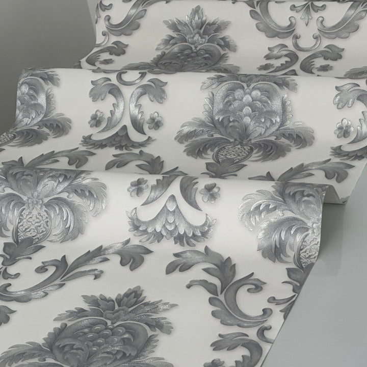 Textured embossed wallpaper with classic damask design