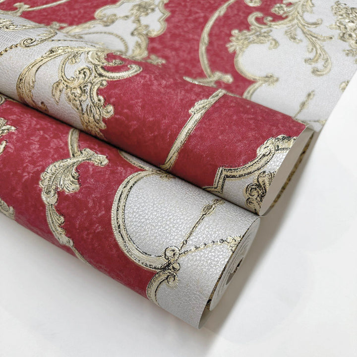 Feature wall with red damask wallpaper pattern