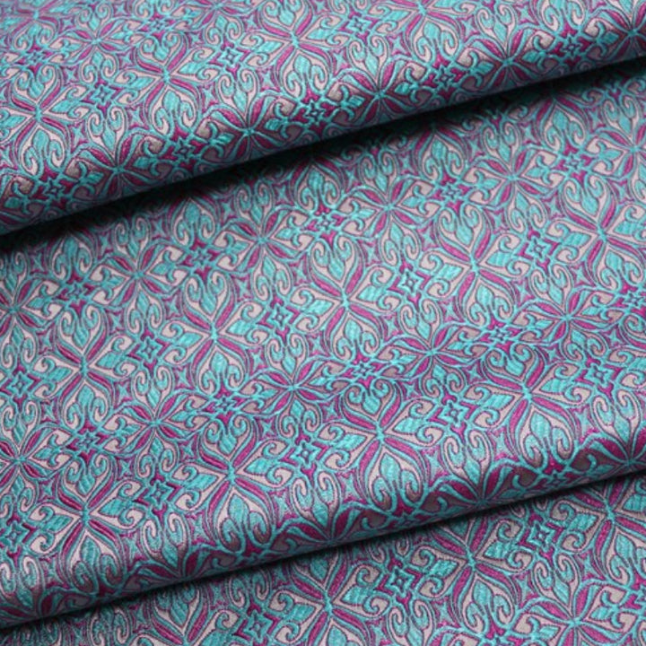 Elegant Teal Brocade with Geometric Patterns

